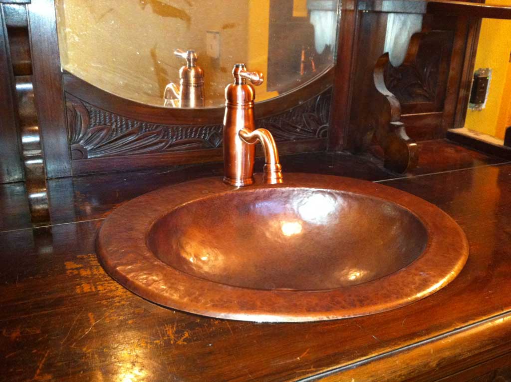 oval copper sink kitchen